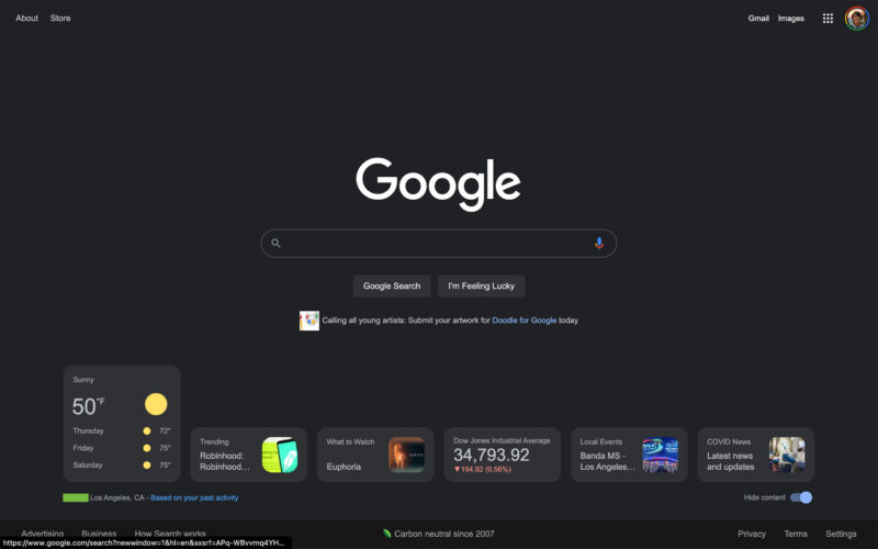 Google.com tests a busier homepage with a row of info cards