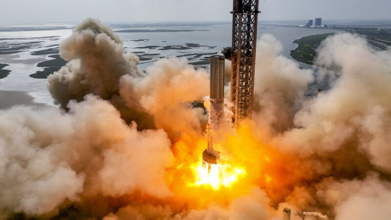 SpaceX fires up 11 engines as it prepares massive rocket for orbital test