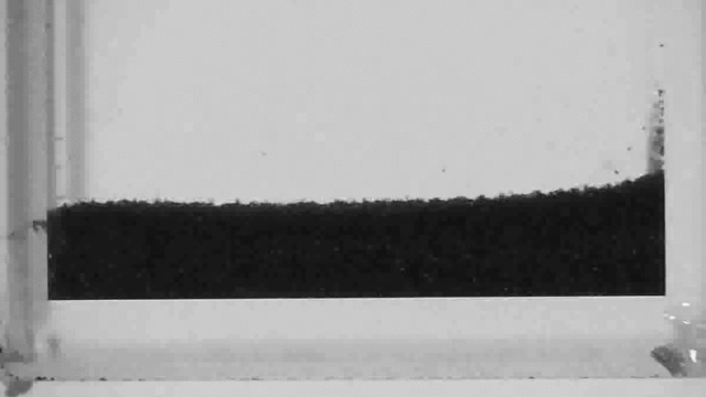 Watch sand defy gravity and flow uphill thanks to “negative friction”