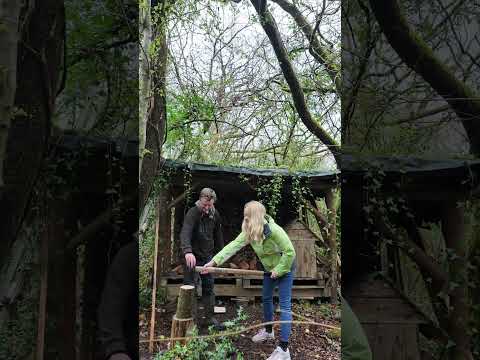Teaching my sister to split and chop wood.